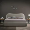 Upholstered_king_size_bed_with_curved_headboard_Aurore_5d691dc4-1967-4f28-aad1-8d87aa6e0cf1