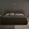 Upholstered_king_size_bed_with_curved_headboard_Aurore_e1ac360a-155e-448d-a4ce-7b0d3afc89aa